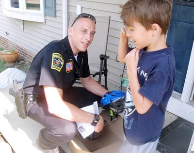 police_helping_boy
