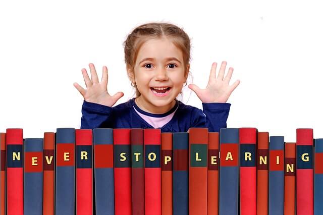 character building, books, red books, blue books, never, stop, learning, girl, smile, cheerful, smart