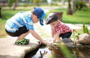 Indiana ranks_children_2 boys_playing_water